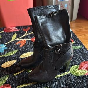 High heel, leather midcalf length black Frye boots